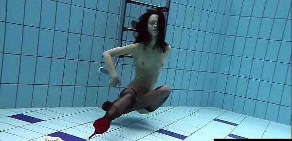  Underwater swimming babe Vera Brass